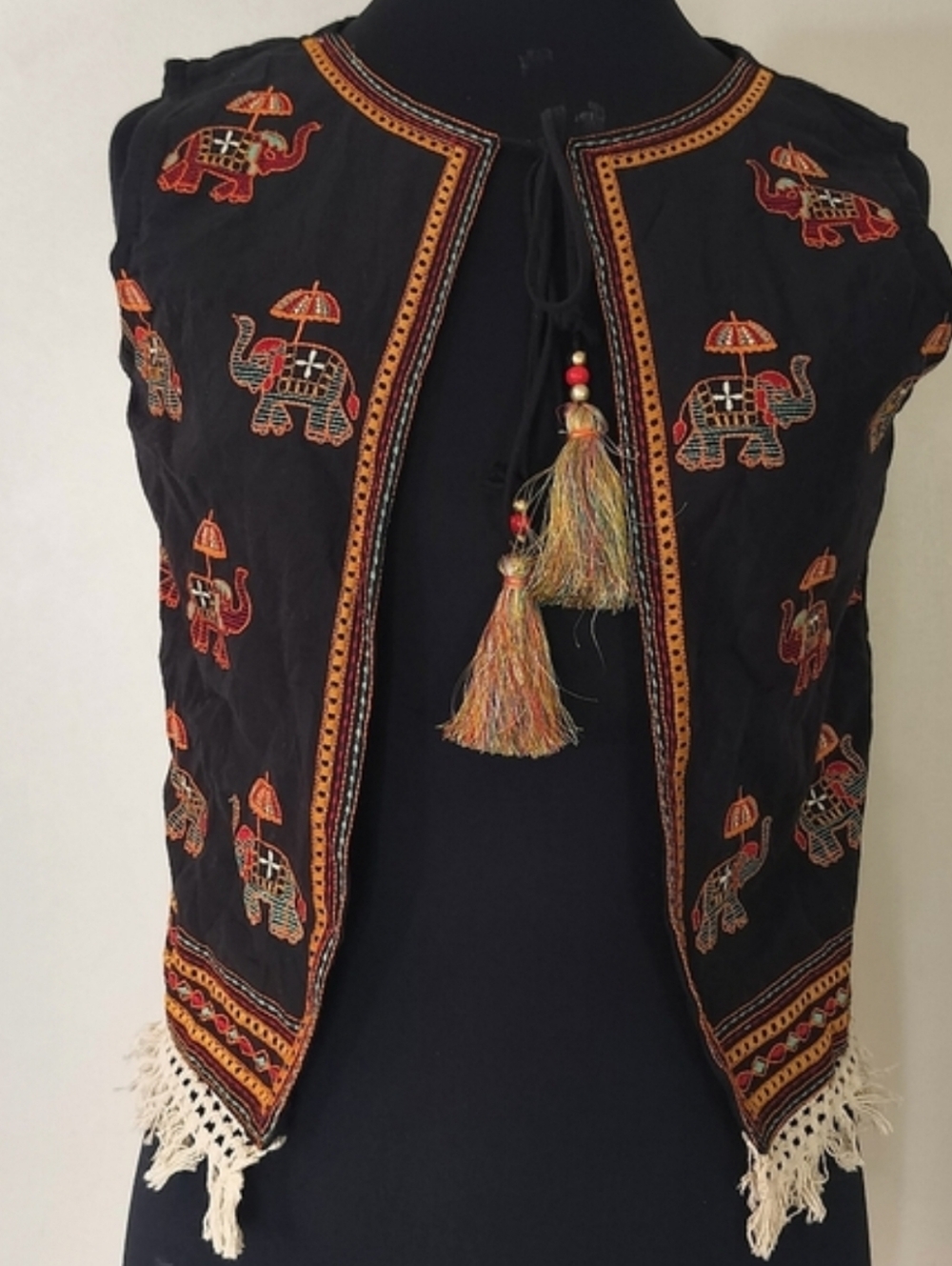 black vest with elephant print